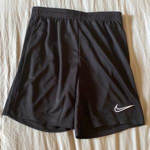 All black Nike shorts